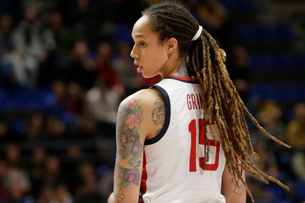Griner returns to U.S., reunites with wife, Cherelle